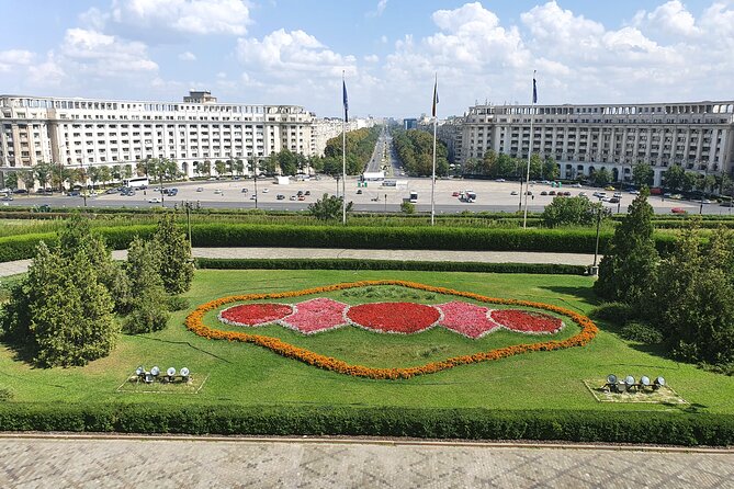 2-Hours Private Bucharest City Tour - Arc of Triumph-style monument, with exhibits that add meaning