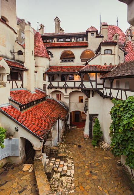Bucharest: Peles & Dracula's Castle and Brasov Full-Day Trip - Transport, group size, and the role of your guide