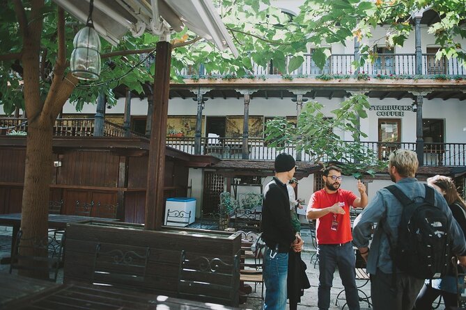Discover Bucharest: Explore Hidden Old Town Walking Tour - French Street and a History Museum angle, walking with purpose