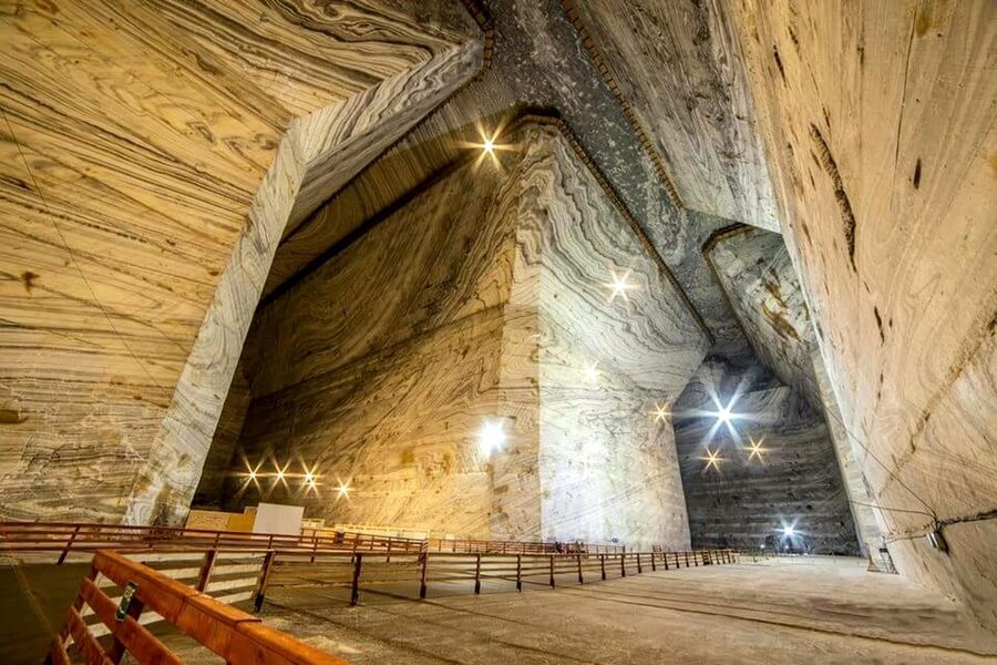 From Bucharest: Private Tour Salina Slanic: Salt Palace - Salt Lake, Wooden Bridge Gallery, and the Visual Moments Worth Slowing Down For
