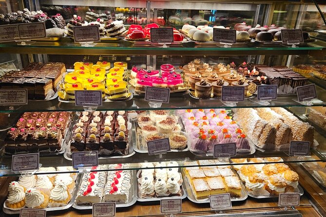 Sweet Delights History and Desserts Walking Tour in Bucharest - Stop 3: Calea Victoriei, French-Style Buildings and the Little Paris Feel